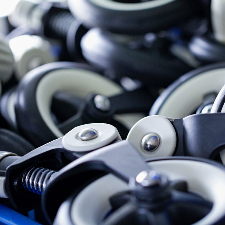 A pile of reused Bugaboo stroller wheels.
