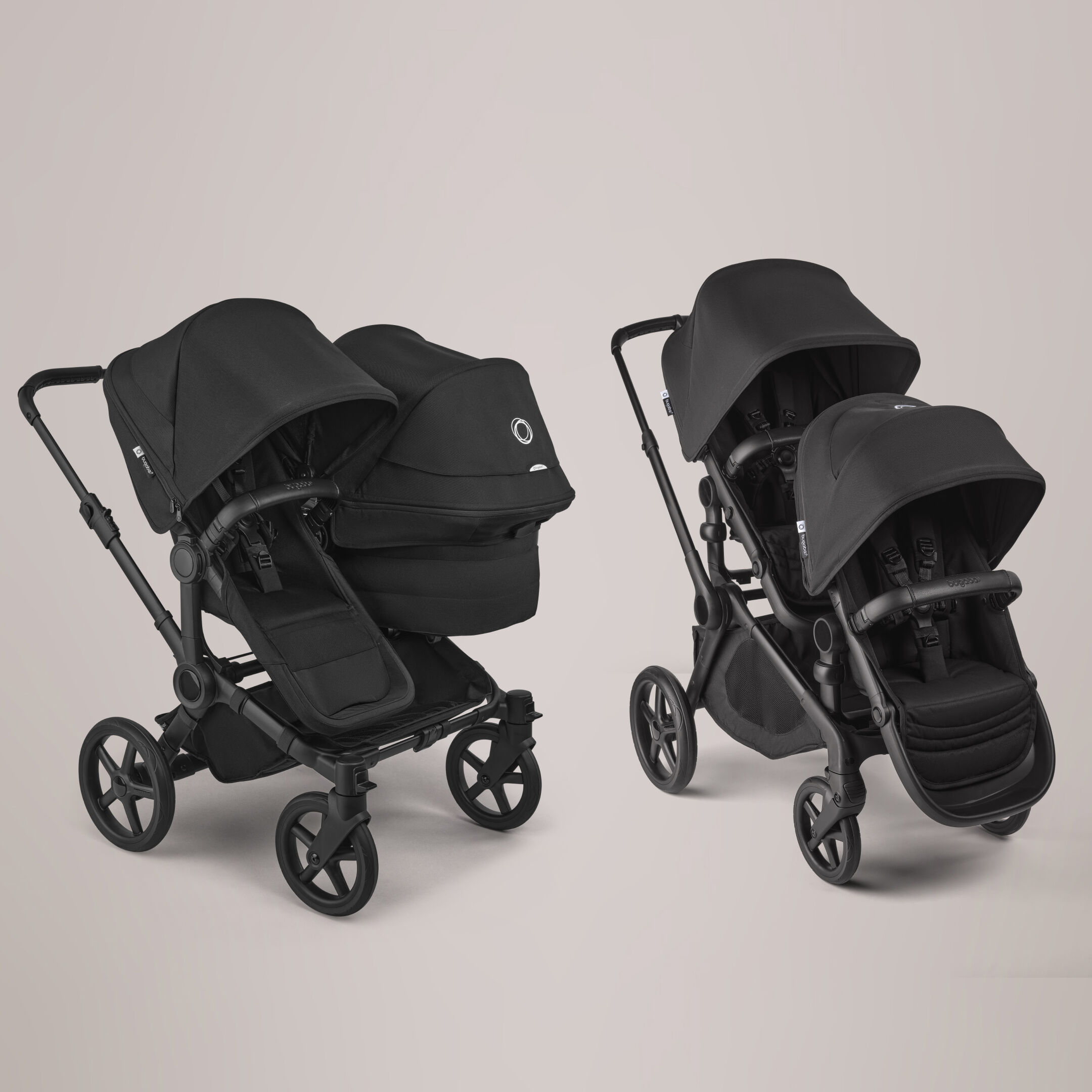A Bugaboo Kangaroo double seat stroller and Donkey 6 double stroller in black