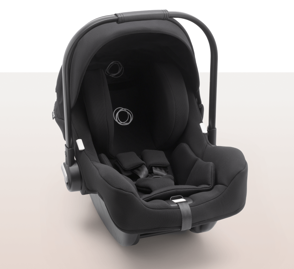 A Bugaboo Turtle by Nuna car seat with the sun canopy and visor fully extended.