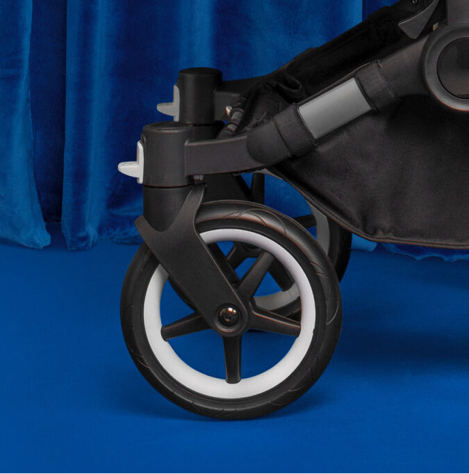  Close up of the wheels of a Bugaboo stroller.