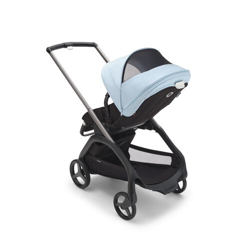 Bugaboo Dragonfly pram with sun canopy in Island coral colour.
