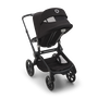 Back view of the Bugaboo Fox 5 pram, with the sun canopy's peekaboo panel visible. - Thumbnail Modal Image Slide 7 of 13