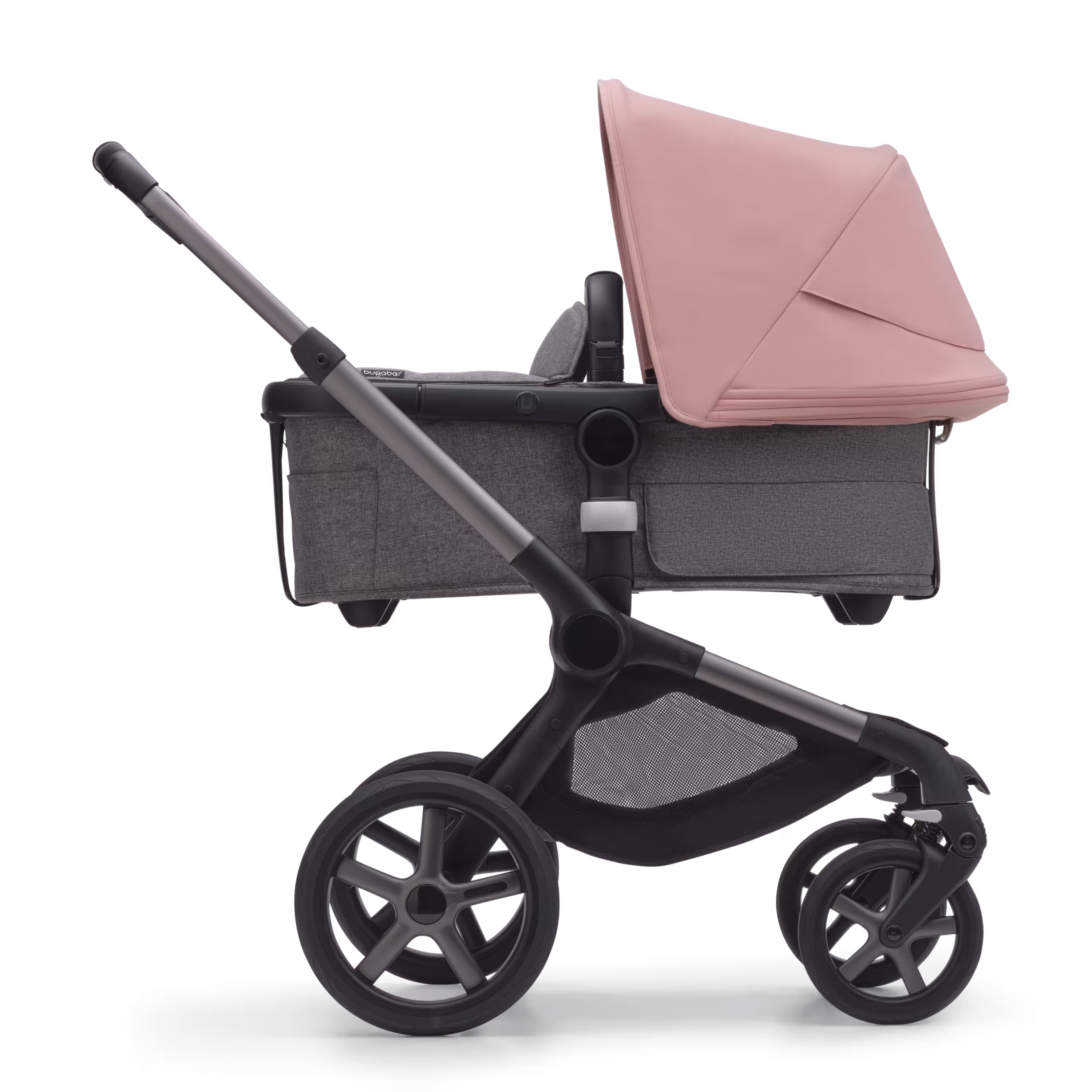 Side view of the Bugaboo Fox 5 carrycot pushchair with graphite chassis, grey melange fabrics and morning pink sun canopy. - Main Modal Image Slide 2 of 13