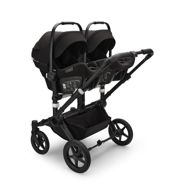 Bugaboo Donkey 5 Duo bassinet and seat stroller black base, midnight black fabrics, forest green sun canopy - Main Image Slide 11 of 12