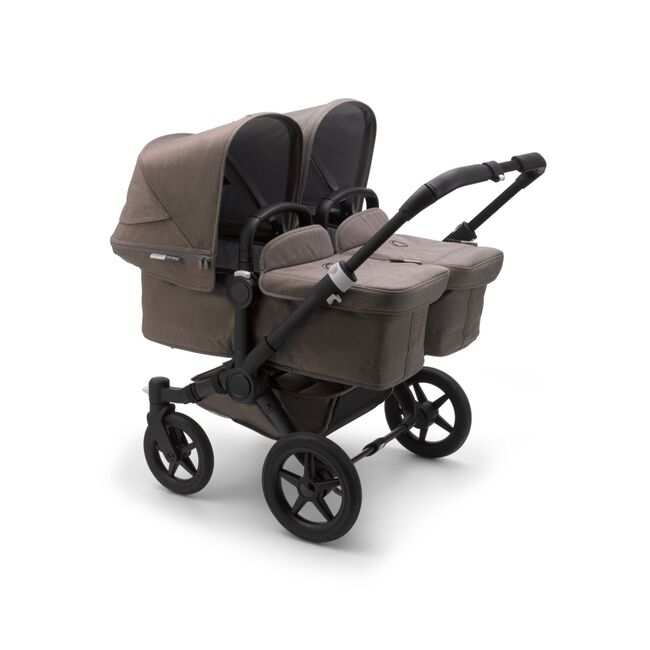 Bugaboo Donkey 3 Twin seat and carrycot pushchair mineral taupe melange sun canopy, mineral taupe melange fabrics, black base - Main Image Slide 1 of 3