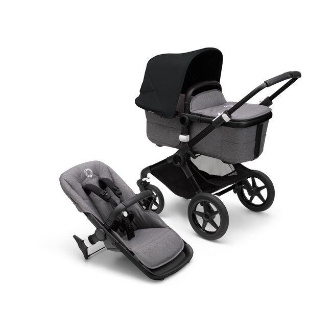 Bugaboo Fox 3 carrycot and seat pushchair with black frame, grey fabrics, and black sun canopy. - Main Image Slide 1 of 7