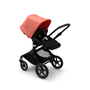 Bugaboo Fox 3 seat stroller with black frame, black fabrics, and red sun canopy.