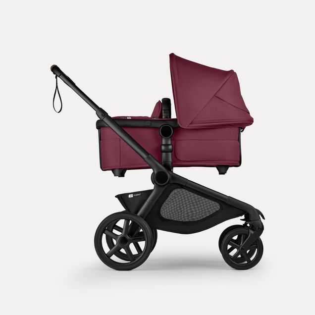 Side view of Bugaboo Kangaroo 2-in-1 stroller with one bassinet, Dark Cherry fabrics, and Dark Cherry sun canopy. - Main Image Slide 2 of 18
