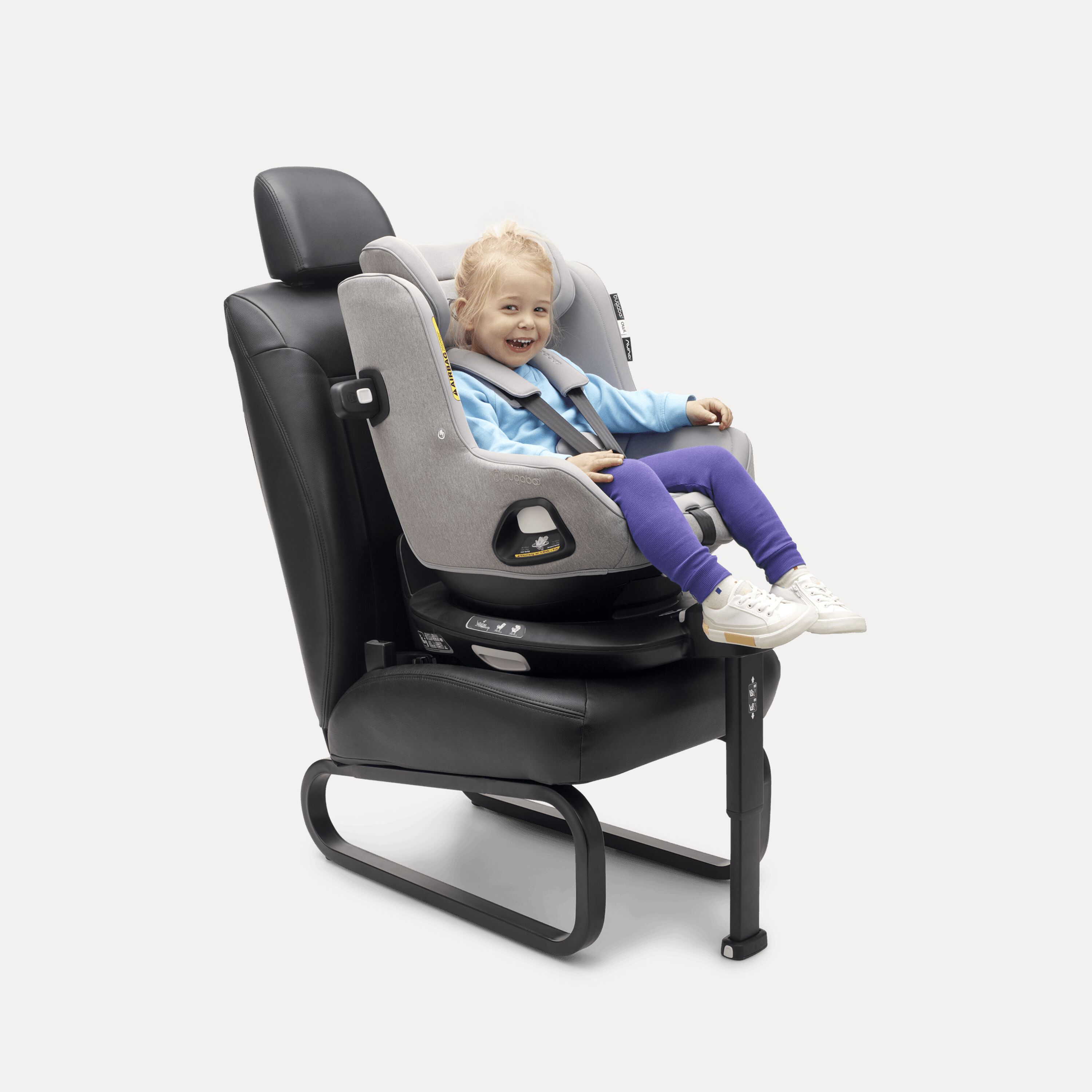 A happy toddler safely seated in the Bugaboo Owl by Nuna with 360 ISOFIX Base. - Main Modal Image Slide 8 of 13