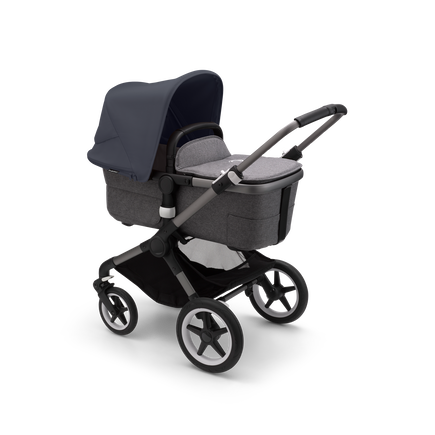 Bugaboo Fox 3 bassinet stroller with graphite frame, grey fabrics, and stormy blue sun canopy.