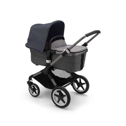 Bugaboo Fox 3 carrycot pushchair with graphite frame, grey fabrics, and stormy blue sun canopy.