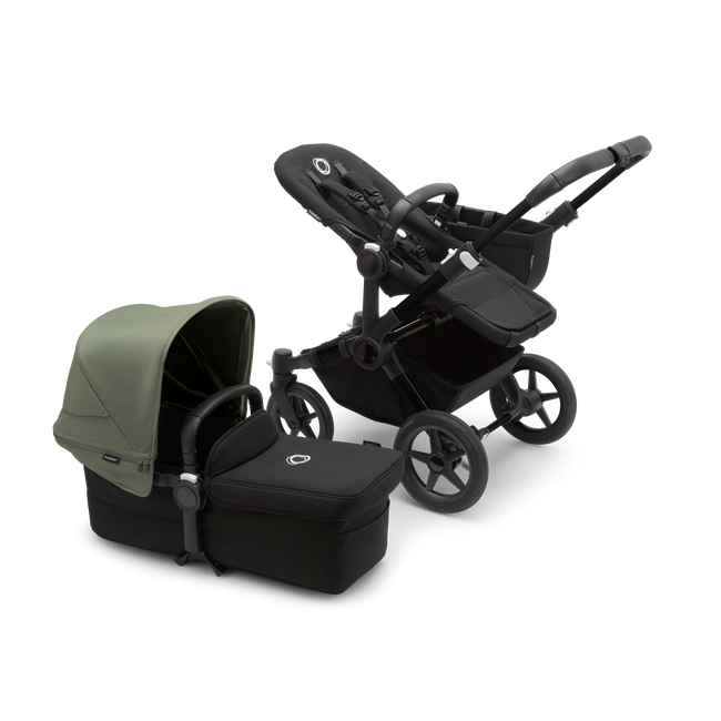 Bugaboo Donkey 5 Mono bassinet and seat stroller black base, midnight black fabrics, forest green sun canopy