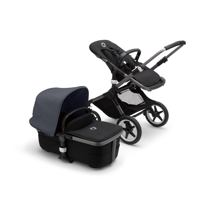 Bugaboo Fox 3 bassinet and seat stroller with graphite frame, black fabrics, and stormy blue sun canopy.
