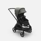 Bugaboo Dragonfly seat stroller with black chassis, midnight black fabrics and forest green sun canopy.