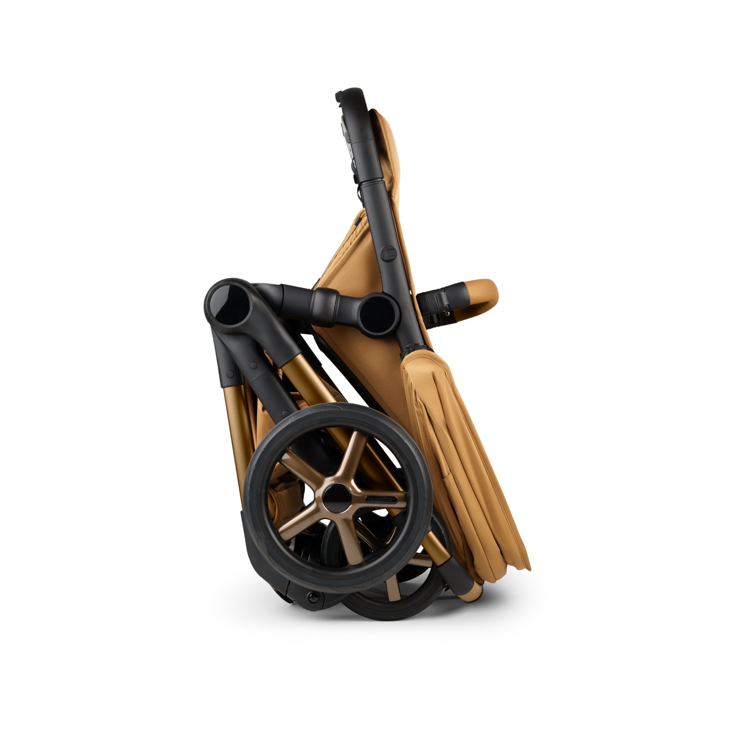 A Bugaboo Fox 5 Noir Limited Edition stroller in Amber Glow, shown in a folded position. - Thumbnail Slide 10 of 15