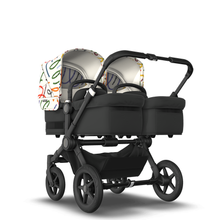 Bugaboo Donkey 5 Twin bassinet and seat stroller black base, midnight black fabrics, art of discovery white sun canopy - view 1