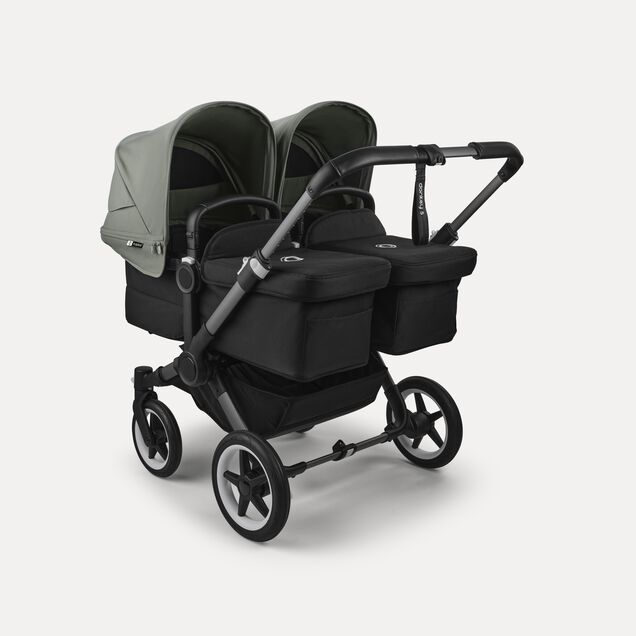 Bugaboo Donkey 5 twin stroller graphite base, midnight black fabrics, forest green sun canopy - Main Image Slide 1 of 12