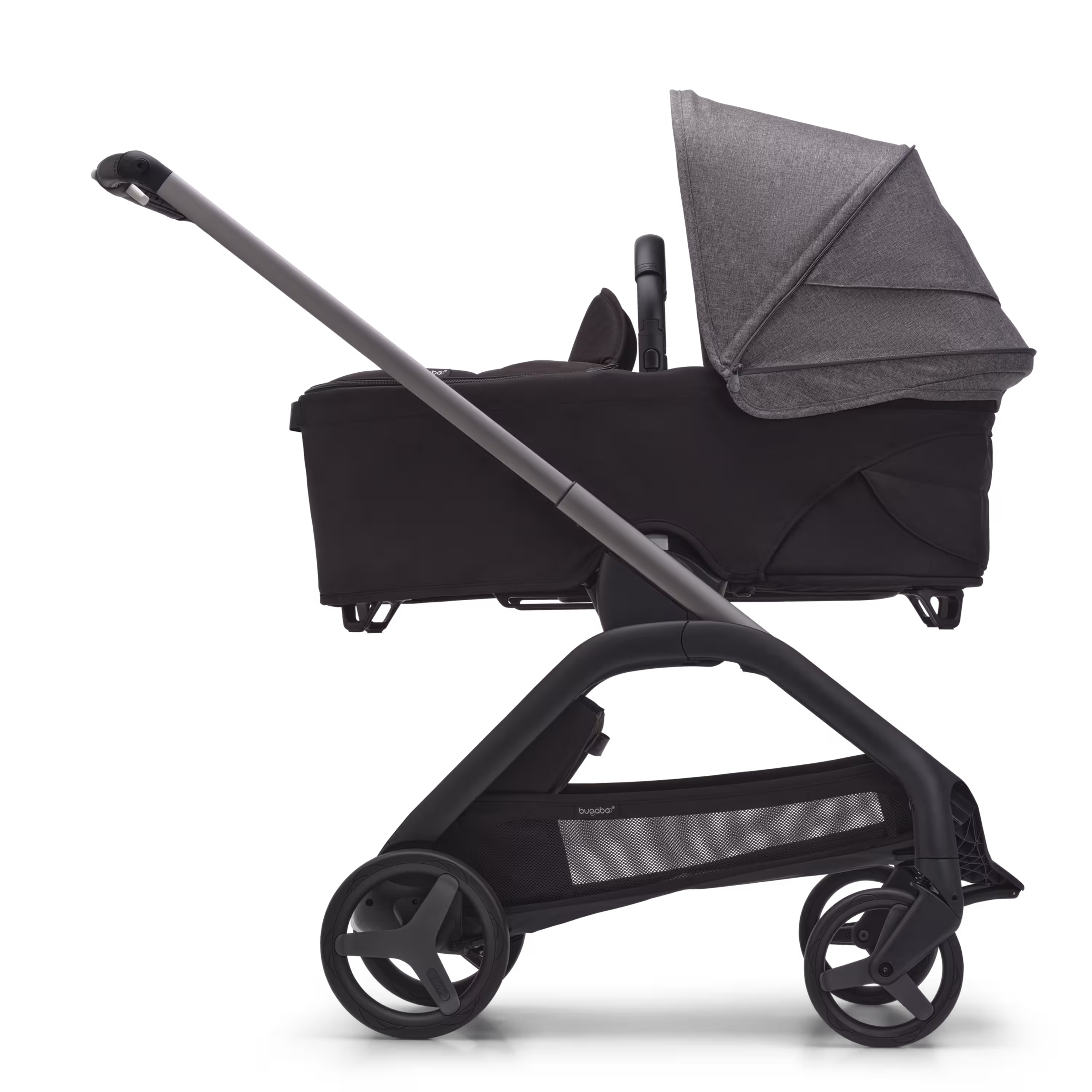 Side view of the Bugaboo Dragonfly bassinet stroller with graphite chassis, midnight black fabrics and grey melange sun canopy. - Main Modal Image Slide 3 of 16
