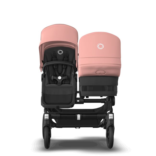 Bugaboo Donkey 5 Duo bassinet and seat stroller black base, midnight black fabrics, morning pink sun canopy - Main Image Slide 2 of 12