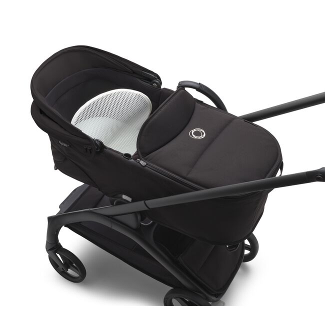 Top view of a Bugaboo Dragonfly stroller with bassinet showing the aerated mattress.