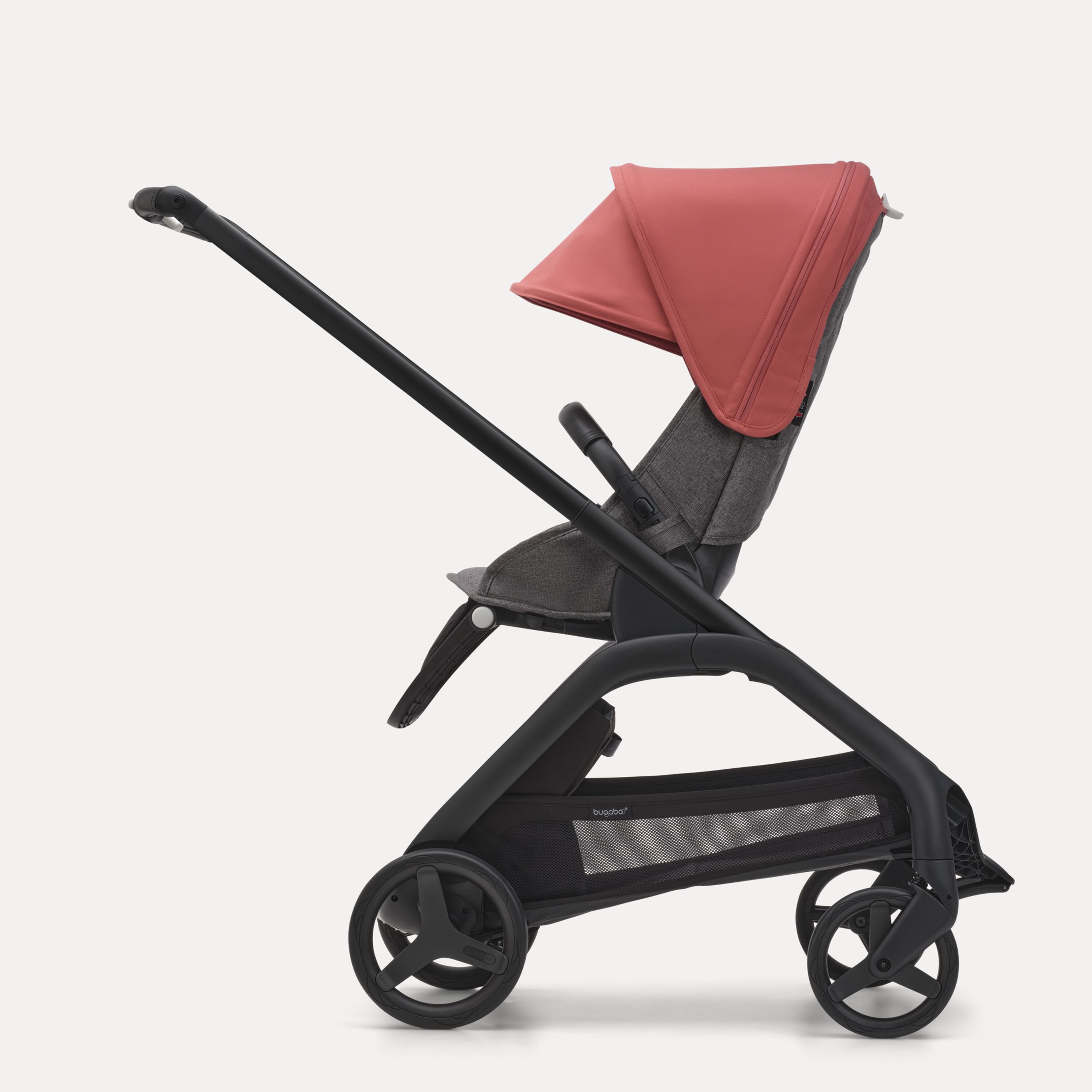Side view of the Bugaboo Dragonfly seat stroller with black chassis, grey melange fabrics and sunrise red sun canopy. - Main Modal Image Slide 2 of 16