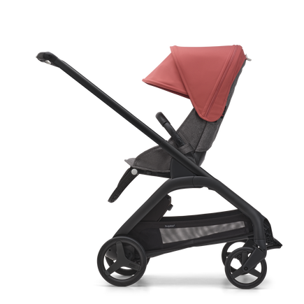 Side view of the Bugaboo Dragonfly seat stroller with black chassis, grey melange fabrics and sunrise red sun canopy. - view 2
