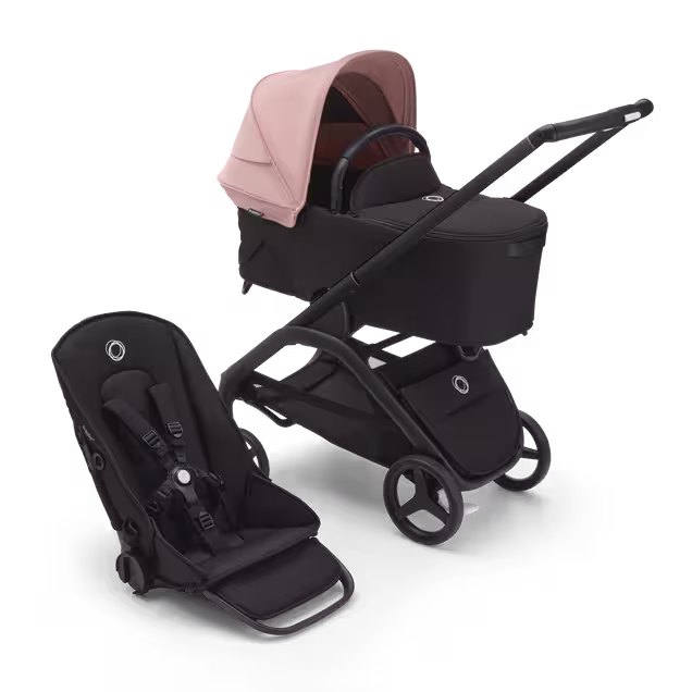 Bugaboo Dragonfly bassinet and seat stroller with black chassis, midnight black fabrics and morning pink sun canopy. - Main Image Slide 1 of 16