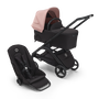 Poussette siège et nacelle Bugaboo Dragonfly avec châssis noir, habillages nuit noire et capote rose matinée.