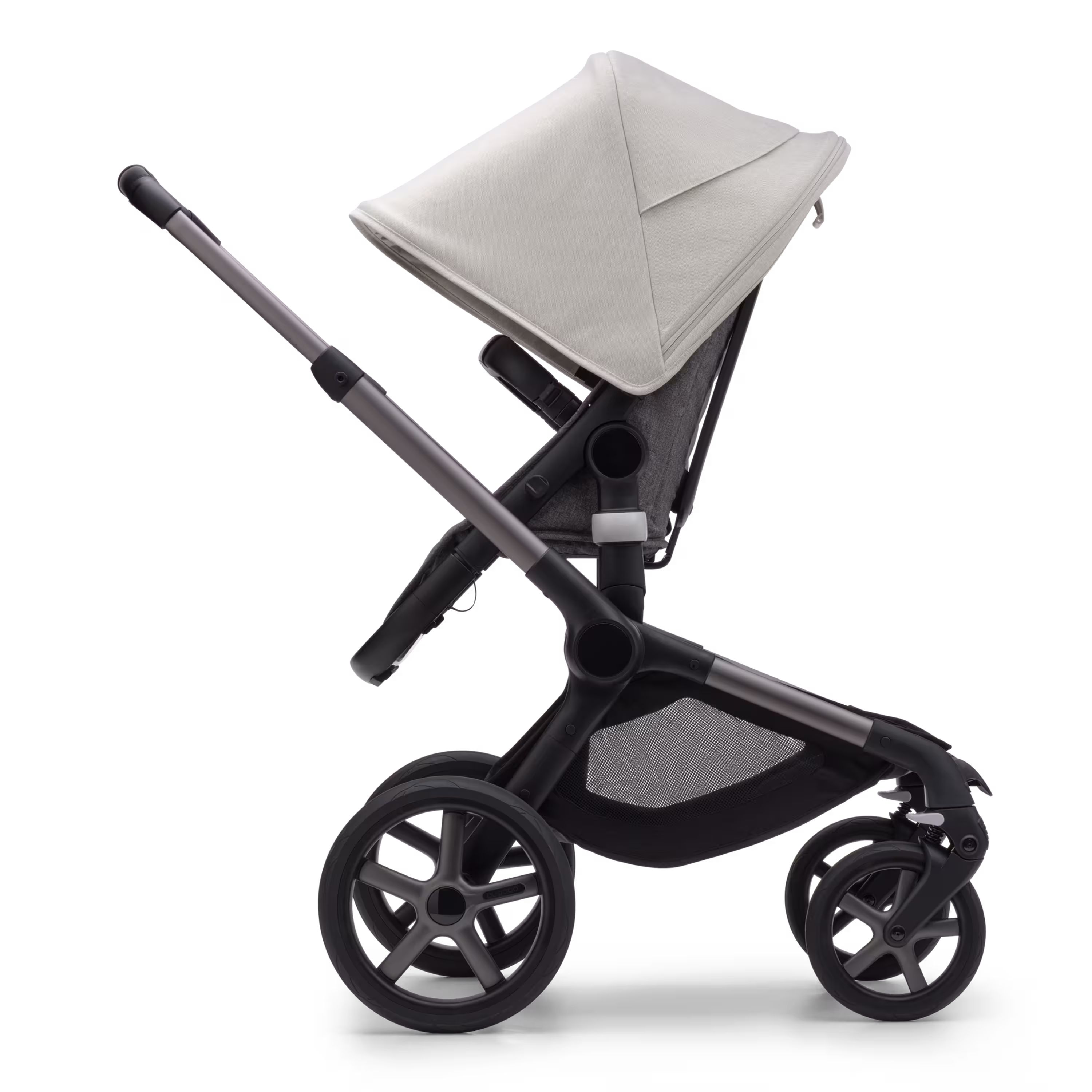 Side view of the Bugaboo Fox 5 seat pushchair with graphite chassis, grey melange fabrics and misty white sun canopy. - Main Modal Image Slide 3 of 13