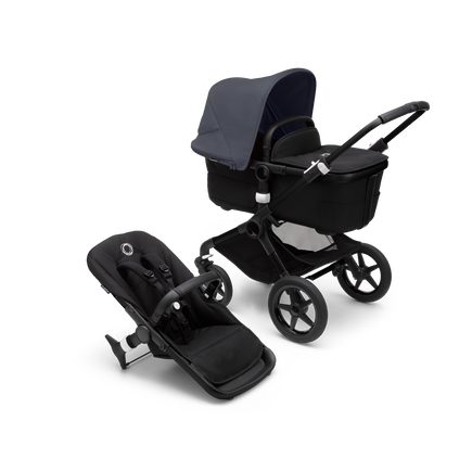 Bugaboo Fox 3 bassinet and seat stroller with black frame, black fabrics, and stormy blue sun canopy.