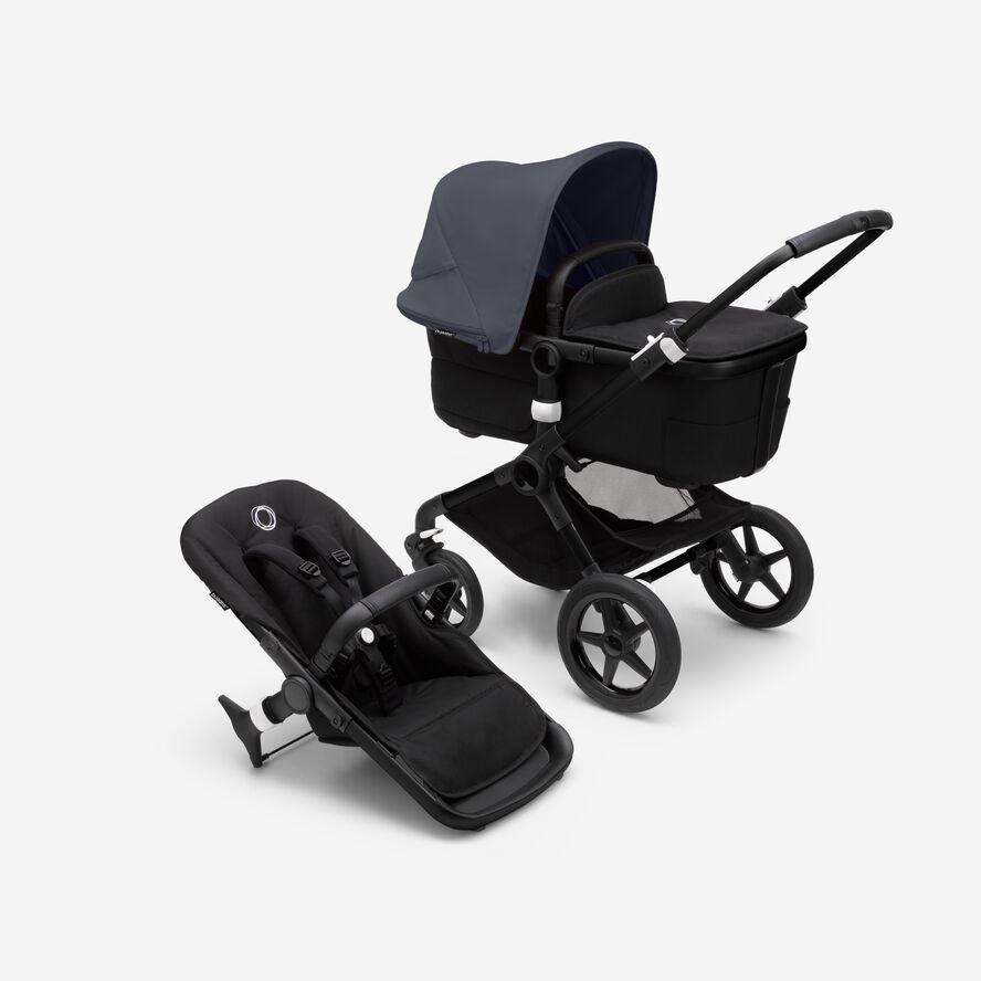 Bugaboo Fox 3 bassinet and seat stroller with black frame, black fabrics, and stormy blue sun canopy.