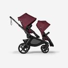 Bugaboo Kangaroo 2-in-1 tandem stroller with two seats, with Dark Cherry fabrics and Dark Cherry sun canopies.