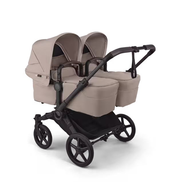 Bugaboo Donkey 6 twin pram black base, desert taupe melange fabrics, desert taupe melange sun canopy - Main Image Slide 1 of 9