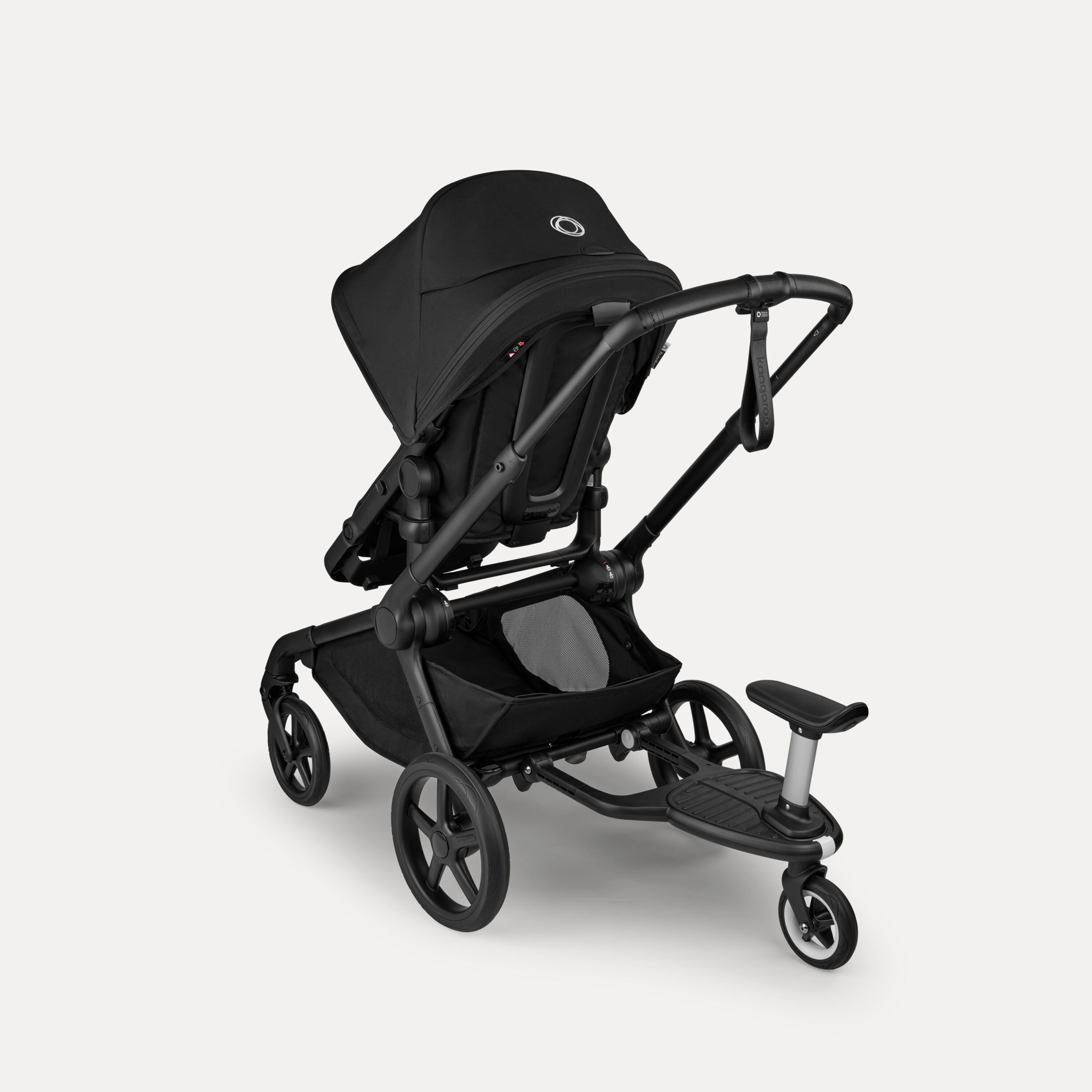 Back view of a Bugaboo Kangaroo 2-in-1 stroller with one seat in black fabric and a wheeled board attached behind. - Main Modal Image Slide 7 of 18
