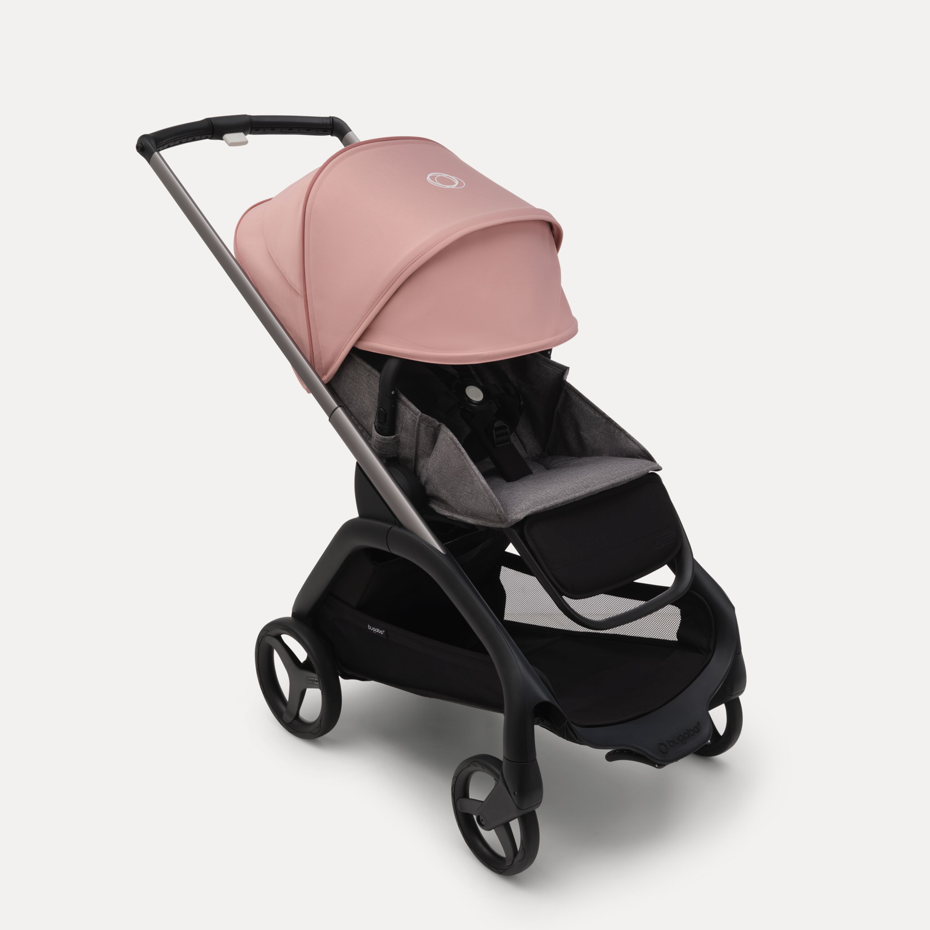 Bugaboo Dragonfly seat stroller with graphite chassis, grey melange fabrics and morning pink sun canopy. The sun canopy is fully extended. - Main Modal Image Slide 3 of 16
