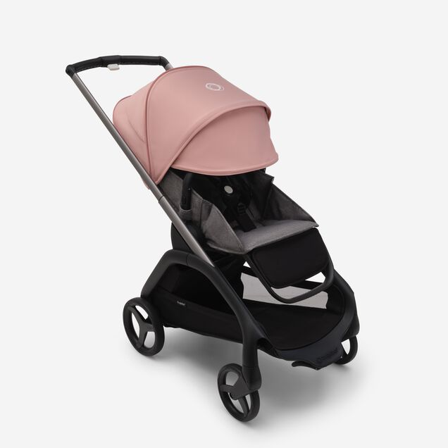 Bugaboo Dragonfly Sitz-Kinderwagen mit graphitgrauem Fahrgestell, grau meliertem Stoff und morgenrosa Sonnendach. Das Sonnendach ist vollständig ausgefahren. - Main Image Slide 3 of 16