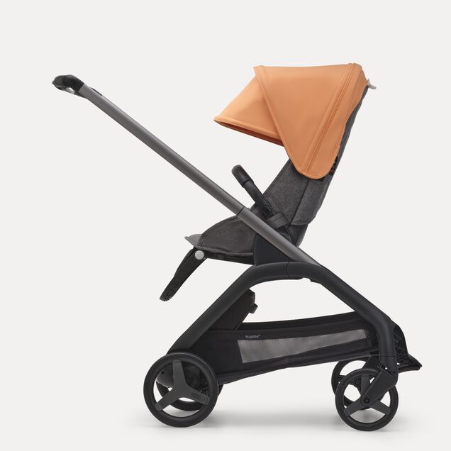 Zijaanzicht van de Bugaboo Dragonfly kinderwagen met stoel met graphite onderstel, grey melange bekleding island coral zonnekap. - Main Image Slide 2 van 16