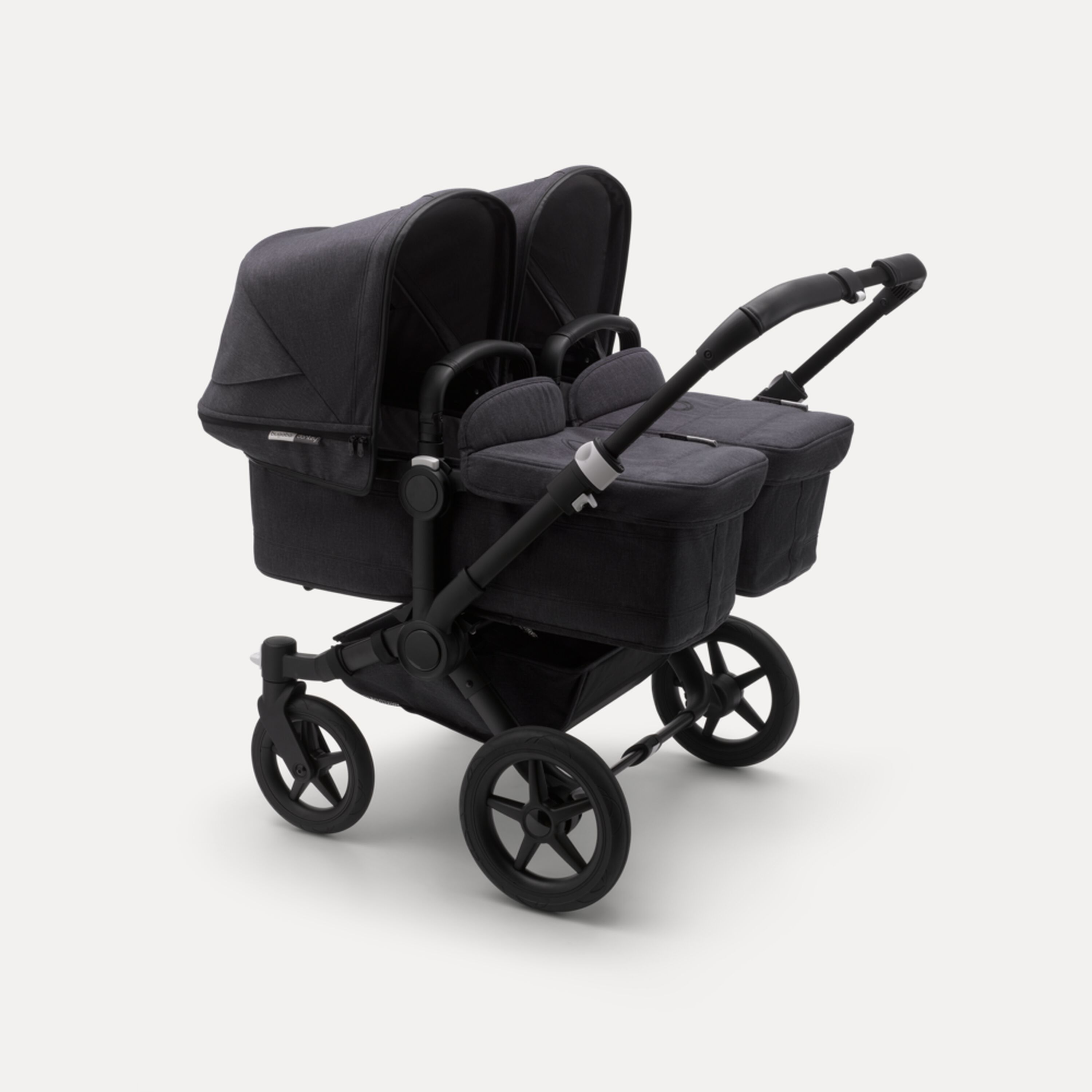 Bugaboo Donkey 3 Twin seat and bassinet stroller mineral washed black sun canopy, mineral washed black fabrics, black base - Main Modal Image Slide 1 of 3