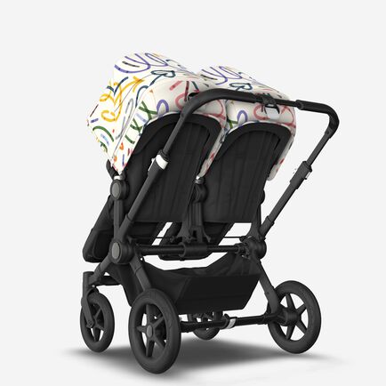 Bugaboo Donkey 5 Twin bassinet and seat stroller black base, midnight black fabrics, art of discovery white sun canopy