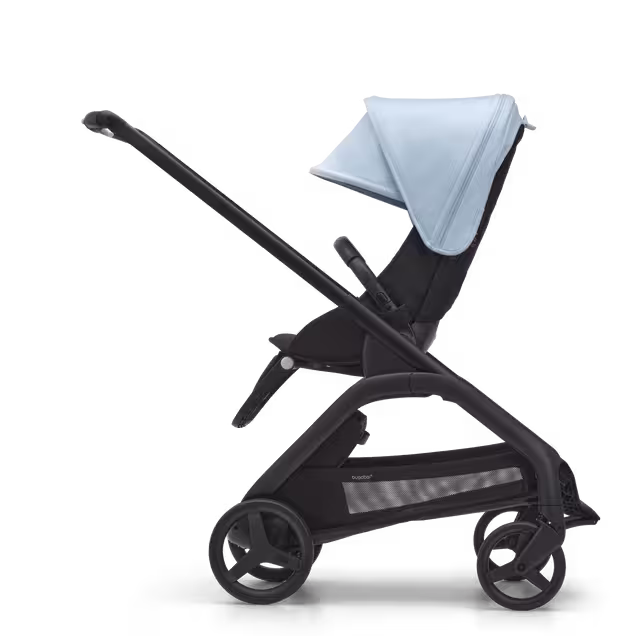 Side view of the Bugaboo Dragonfly seat stroller with black chassis, midnight black fabrics and skyline blue sun canopy. - Main Image Slide 2 of 16