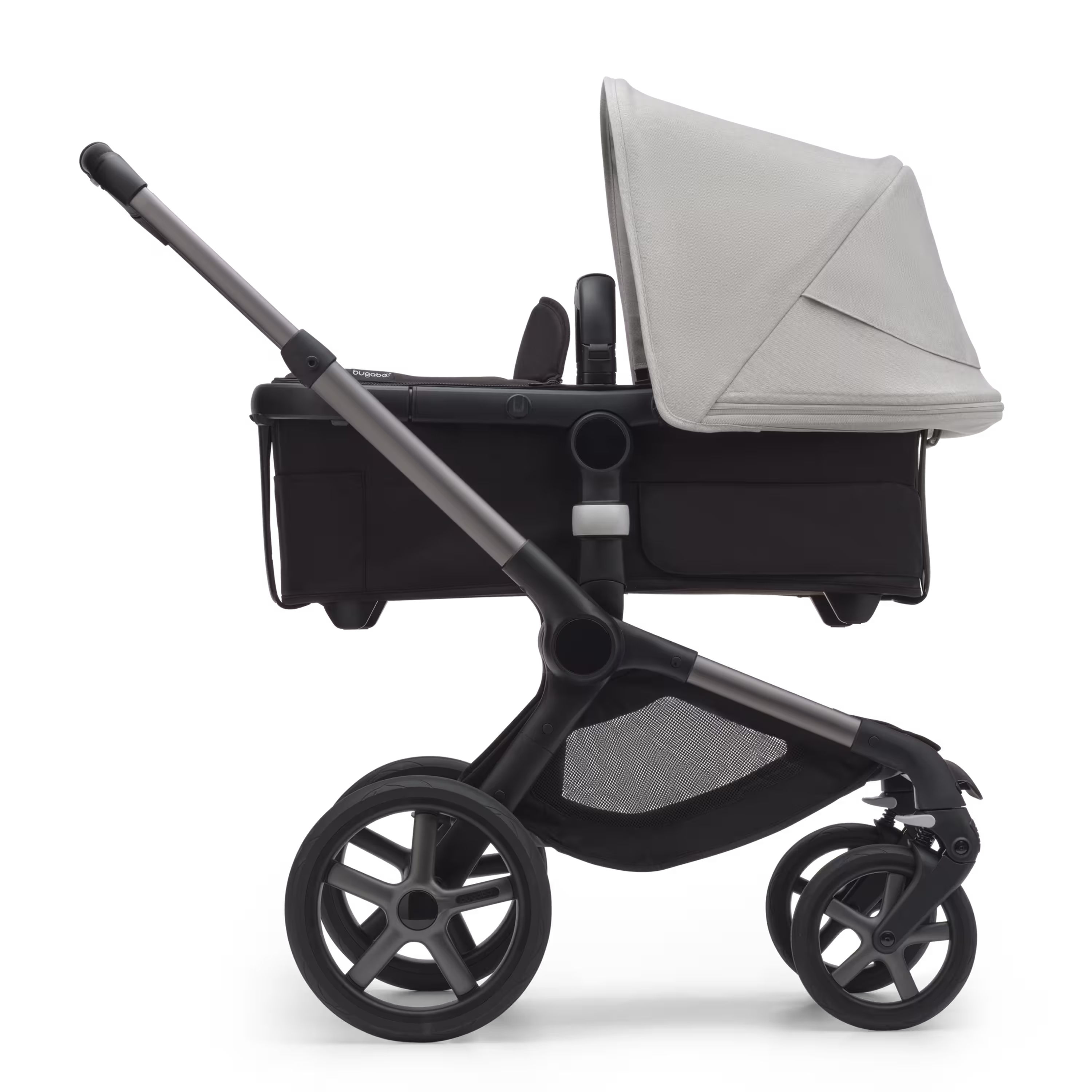 Side view of the Bugaboo Fox 5 carrycot pushchair with graphite chassis, midnight black fabrics and astro purple sun canopy. - Main Modal Image Slide 2 of 13