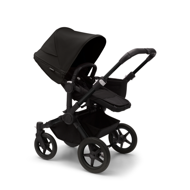 Bugaboo Donkey 5 Mono seat stroller with black chassis, midnight black fabrics and midnight black sun canopy.