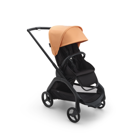 Bugaboo Dragonfly seat stroller with black chassis, midnight black fabrics and island coral sun canopy. - view 1