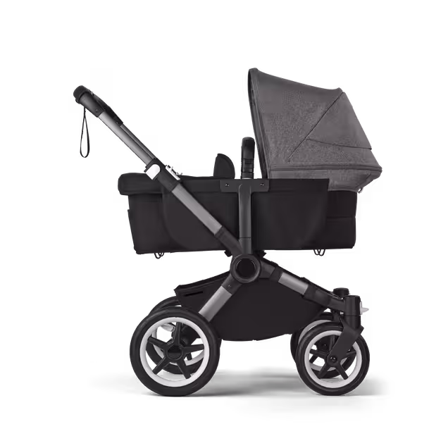 Refurbished Bugaboo Donkey 5 Mono bassinet and seat stroller graphite base, midnight black fabrics, grey mélange sun canopy - Main Image Slide 3 of 11
