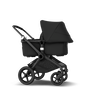 Bugaboo Fox 2 seat and carrycot pushchair black sun canopy, black fabrics, black chassis