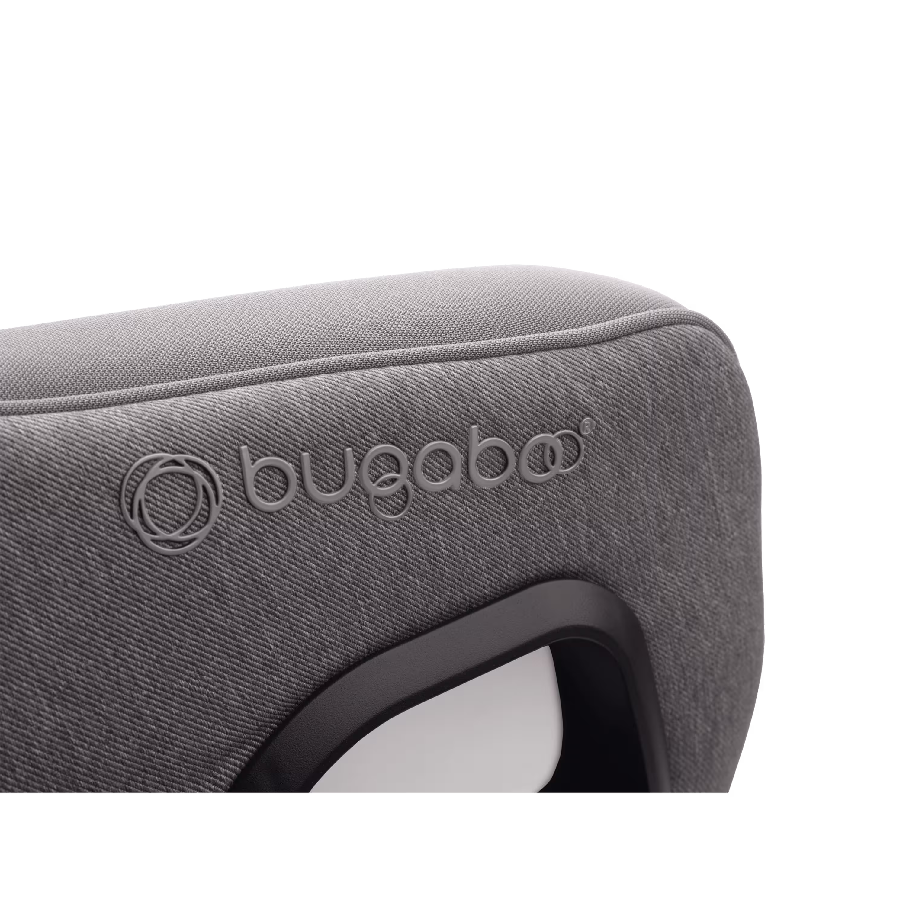 Close up of the embossed Bugaboo logo on the Bugaboo Owl by Nuna car seat in grey fabrics. - Main Modal Image Slide 11 of 13