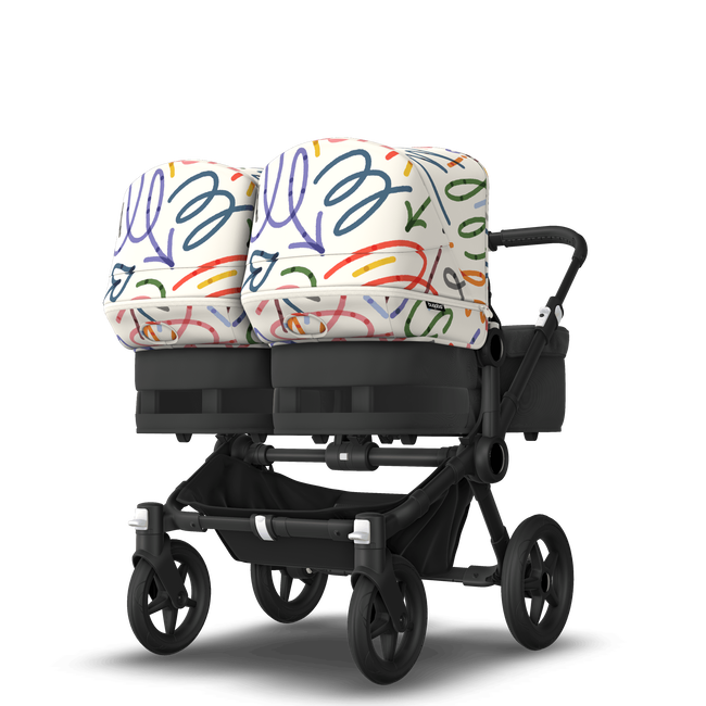 Bugaboo Donkey 5 Twin bassinet and seat stroller black base, midnight black fabrics, art of discovery white sun canopy