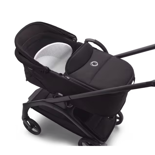 Bugaboo Dragonfly bassinet and seat stroller black base, midnight black fabrics, forest green sun canopy - Main Image Slide 11 van 15