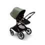 Bugaboo Fox 3 seat stroller with graphite frame, black fabrics, and forest green sun canopy.