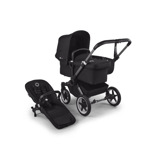 Refurbished Bugaboo Donkey 5 Mono bassinet and seat pushchair graphite base, midnight black fabrics, grey midnight black canopy - Main Image Slide 1 of 1